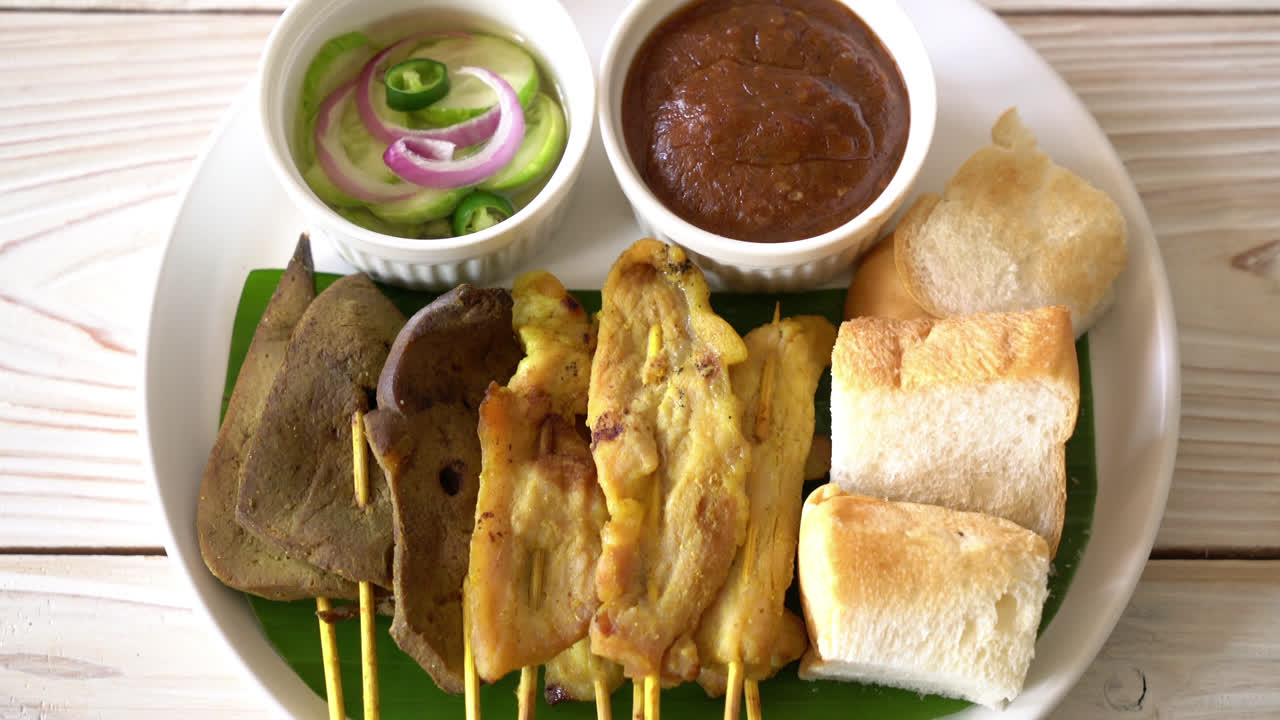 Pork Satay and Liver Satay with Bread and Peanut Sauce