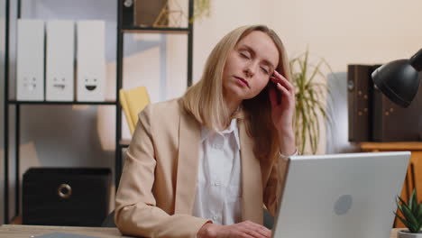 tired young business woman suffering from headache problem tension migraine stress at home office