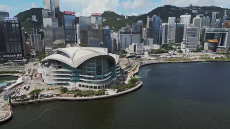 aerial of the hong kong convention and exhibition centre and city skyline, wan chai, hong kong, china