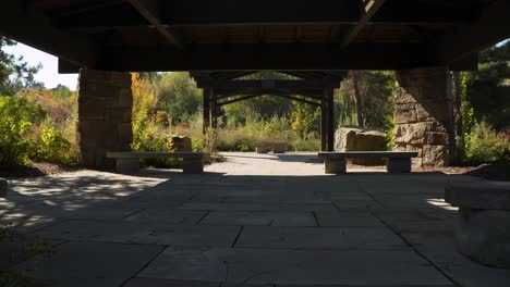 a stone and wood gazebo in a park in boise, idaho