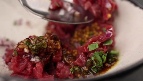 preparing beef carpaccio or similar dish