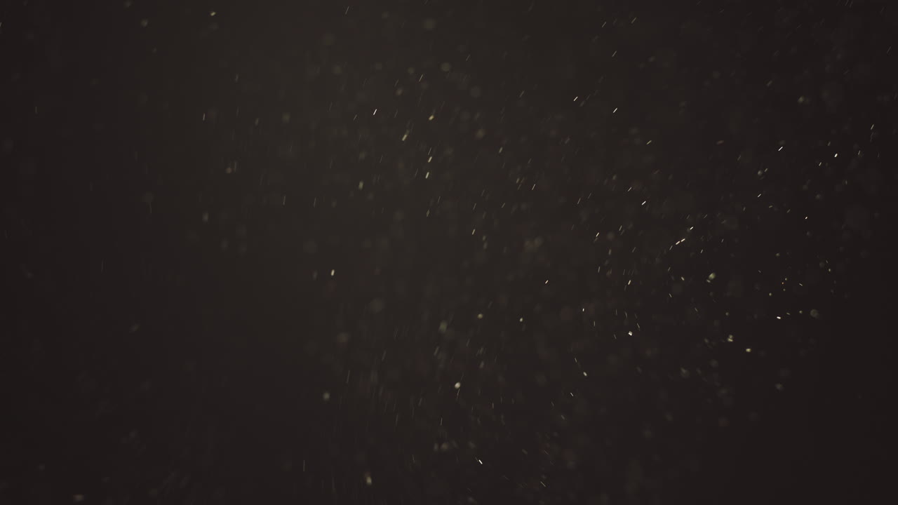 먼지 입자가있는 어두운 배경