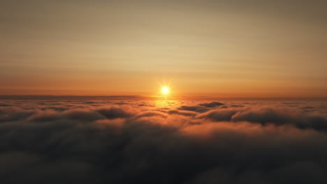 sunrise or sunset over clouds