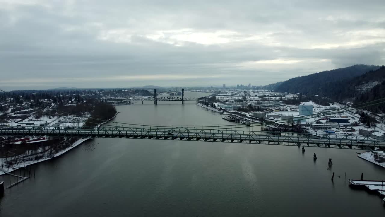 US, Oregon, Portland, St Johns, 2025-02-14 - Drone view of the St Johns Bridge in Portland in the snow