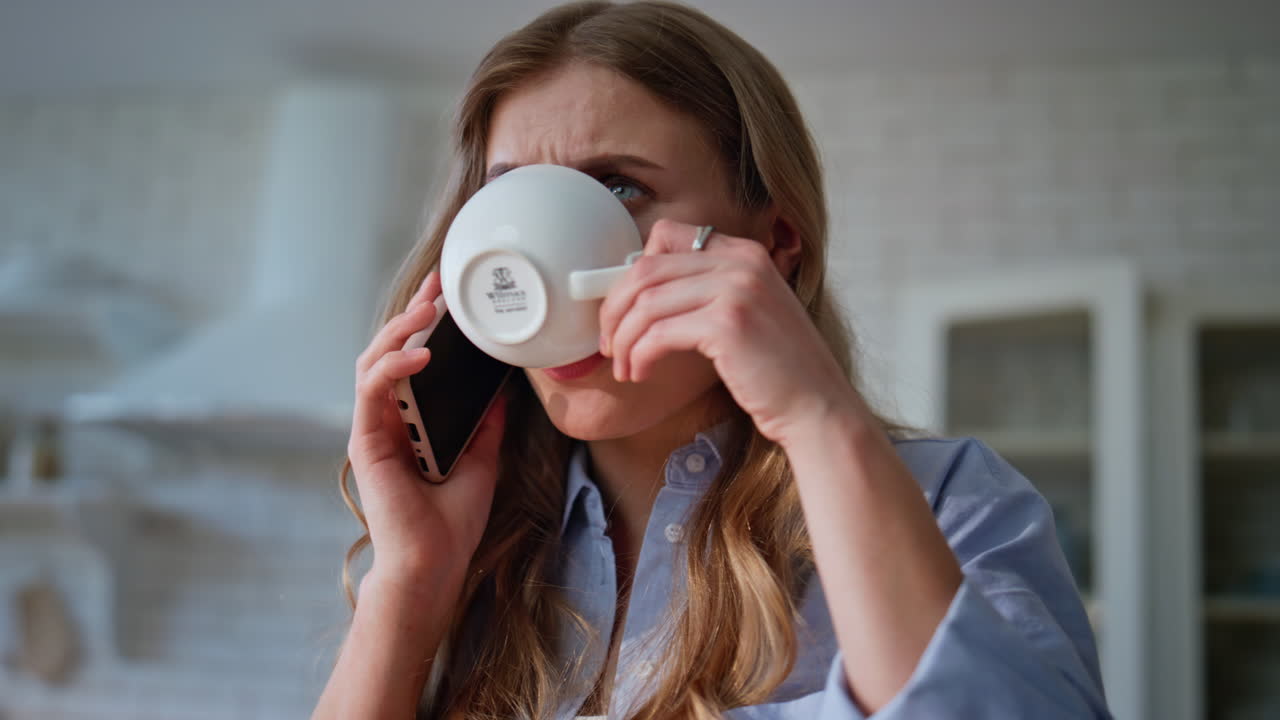 Closeup woman talking smartphone enjoying home morning. Girl speaking mobile