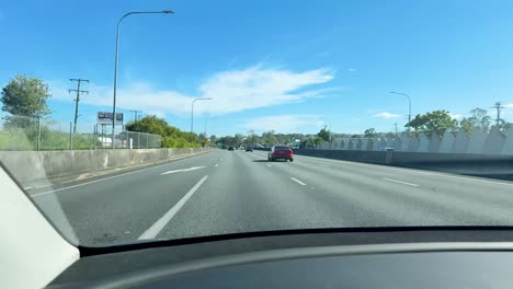 car travels smoothly under clear blue skies