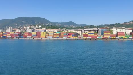 italy florence jun 2   2022 a view from port of florence colourful containers green mountains and town