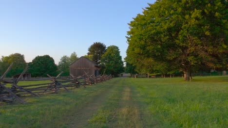 A-path-and-fence-that-lead-to-the-frame-house-near-the-Joseph-Smith-family-farm,-temple,-visitors-center,-sacred-grove-in-Palmyra-New-York-Origin-locations-for-the-Mormons-and-the-book-of-Mormon