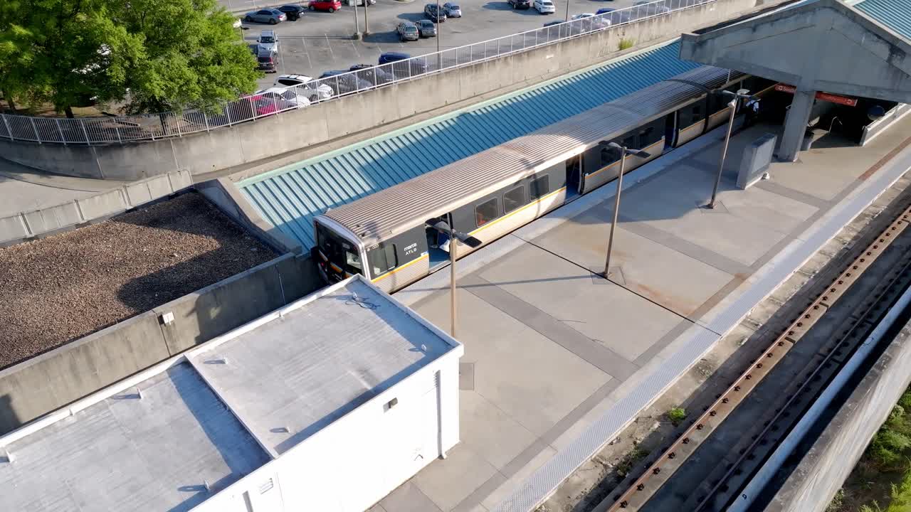 Marta train at Doraville subway station, New Peachtree road, Atlanta, Georgia, Drone shot