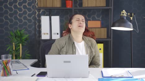 business woman suffering from stomach ache.
