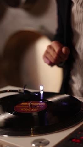 dj playing a vinyl record