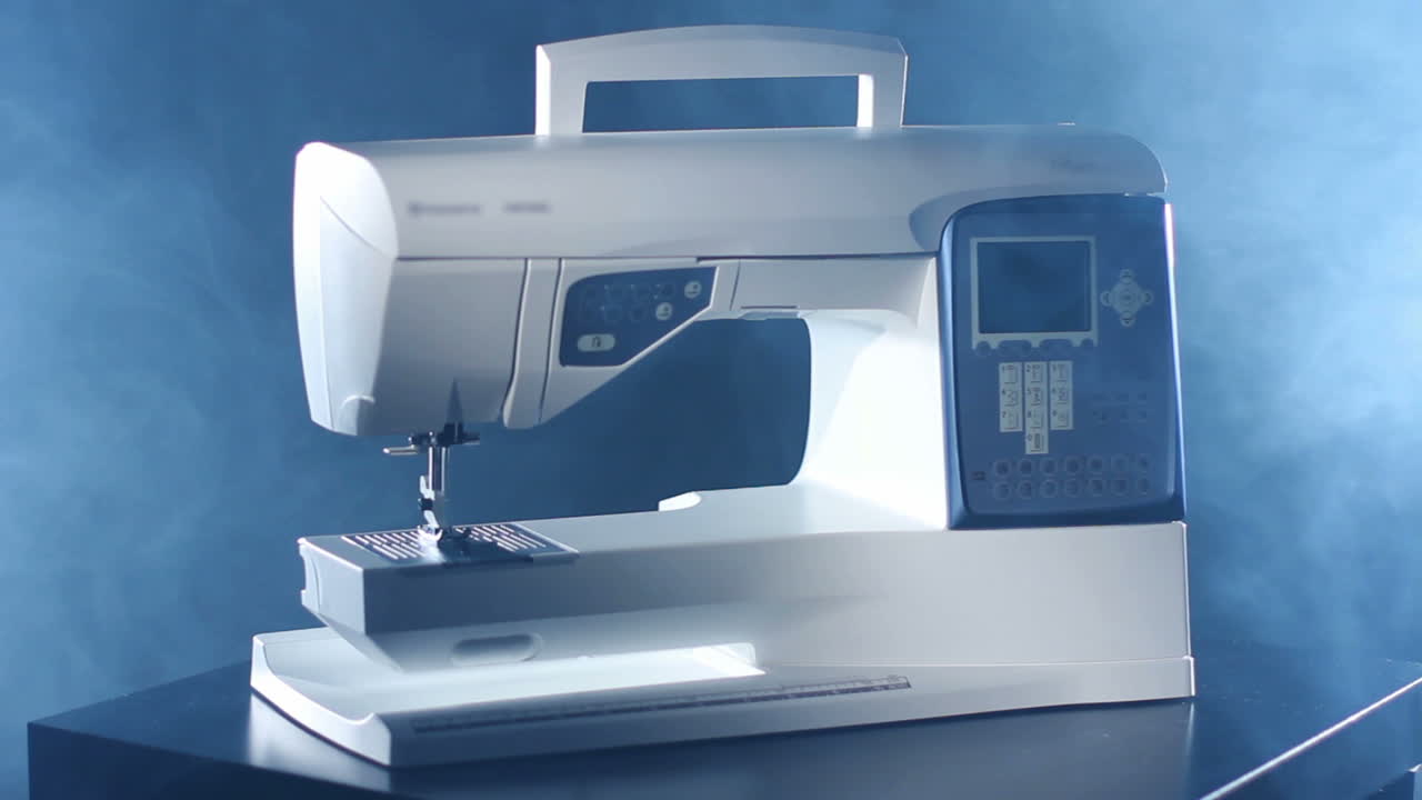 Modern sewing machine. Electronic sewing machine. Household equipment