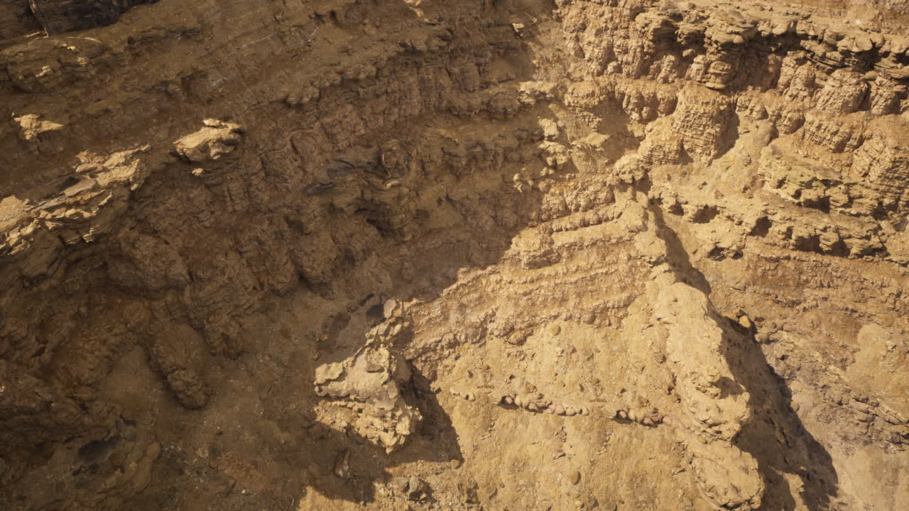 Exploration of rugged terrain in an arid landscape during daylight hours