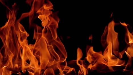 Flames-of-fire-on-black-background-in-slow-motion