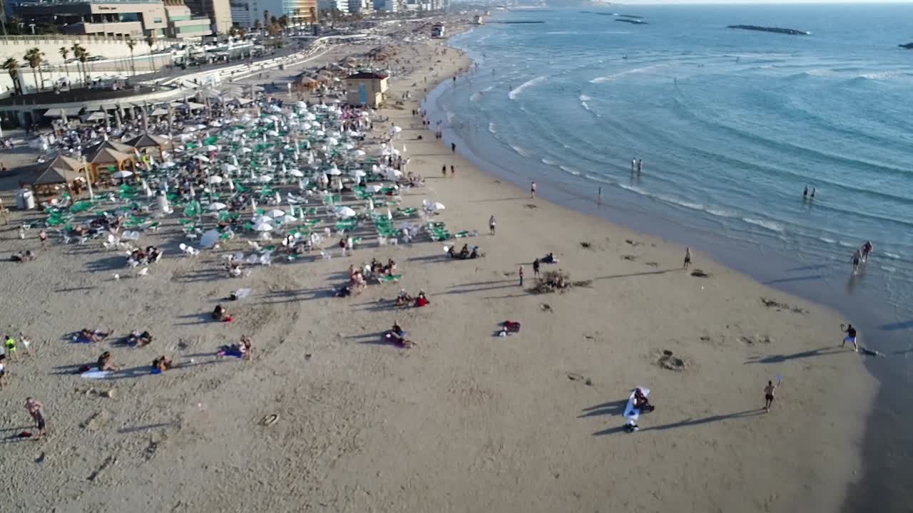 Drone shot on the beach in summer. Mediterranean Sea.