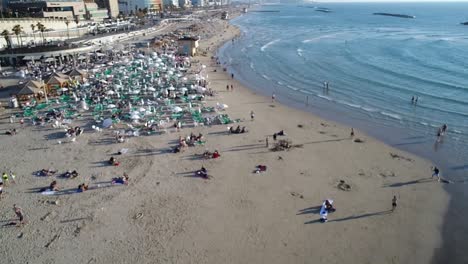 drone shot on the beach in summer. mediterranean sea.