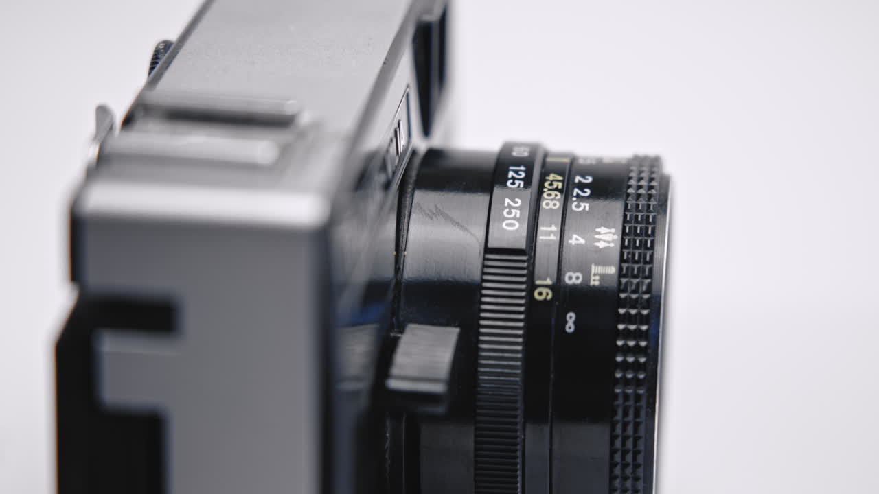 câmara de fotografia vintage e lente