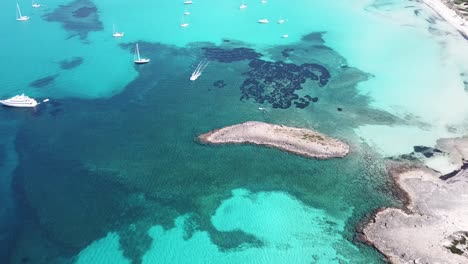 amazing drone aerial landscape of the charming beach es trencs. it has earned the reputation of caribbean beach of mallorca. spain