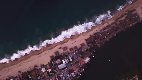 Wide-angle-birds-eye-view-of-Acapulco-beach-village-during-calm-day