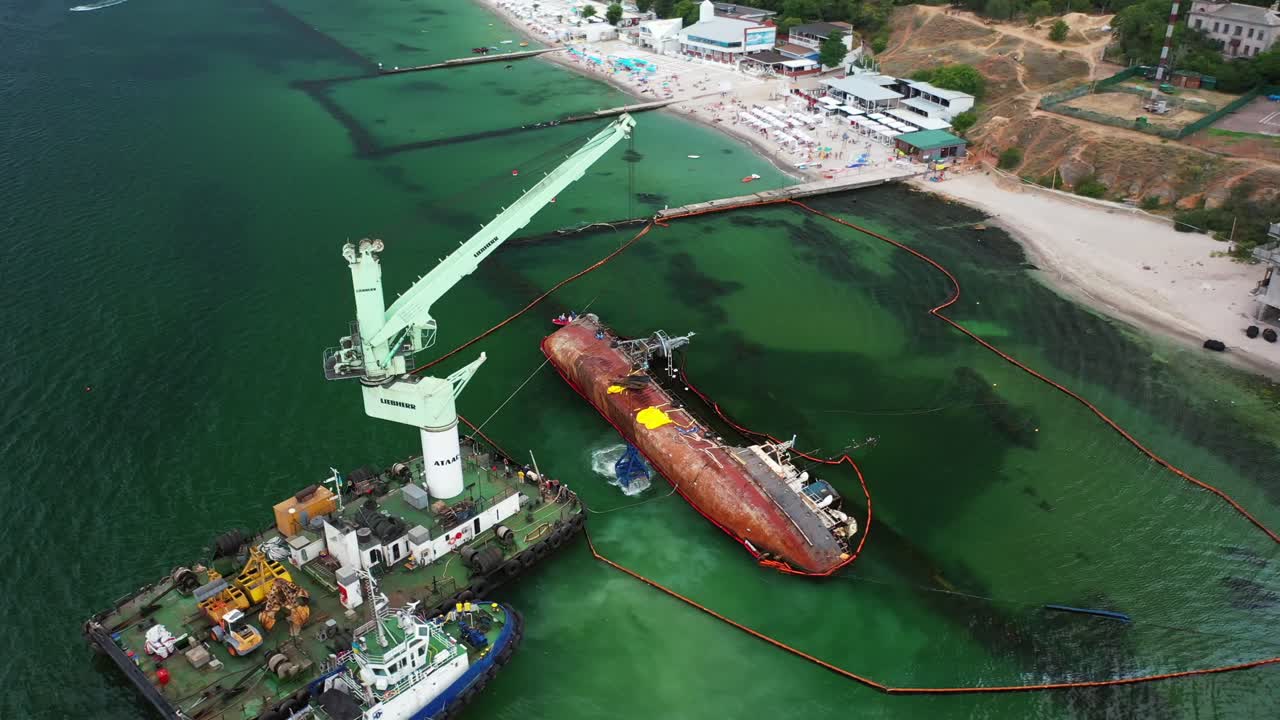 Shipwreck Salvage Operation at Coastal Beach