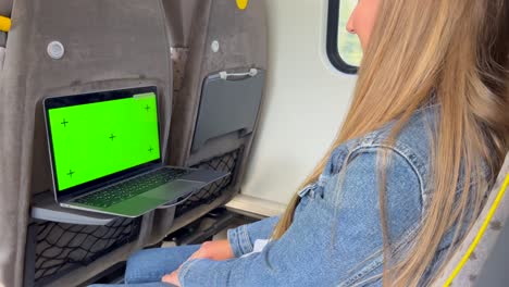 a young girl uses a laptop while traveling on a tr 4k 2025 07 22 06 18 38 utc.mov | attractive, background, beautiful, businessman