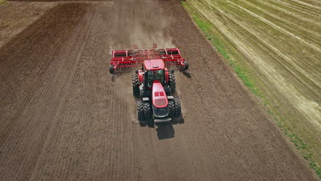 Agriculture-machinery.-Agricultural-tractor-plowing-farming-field