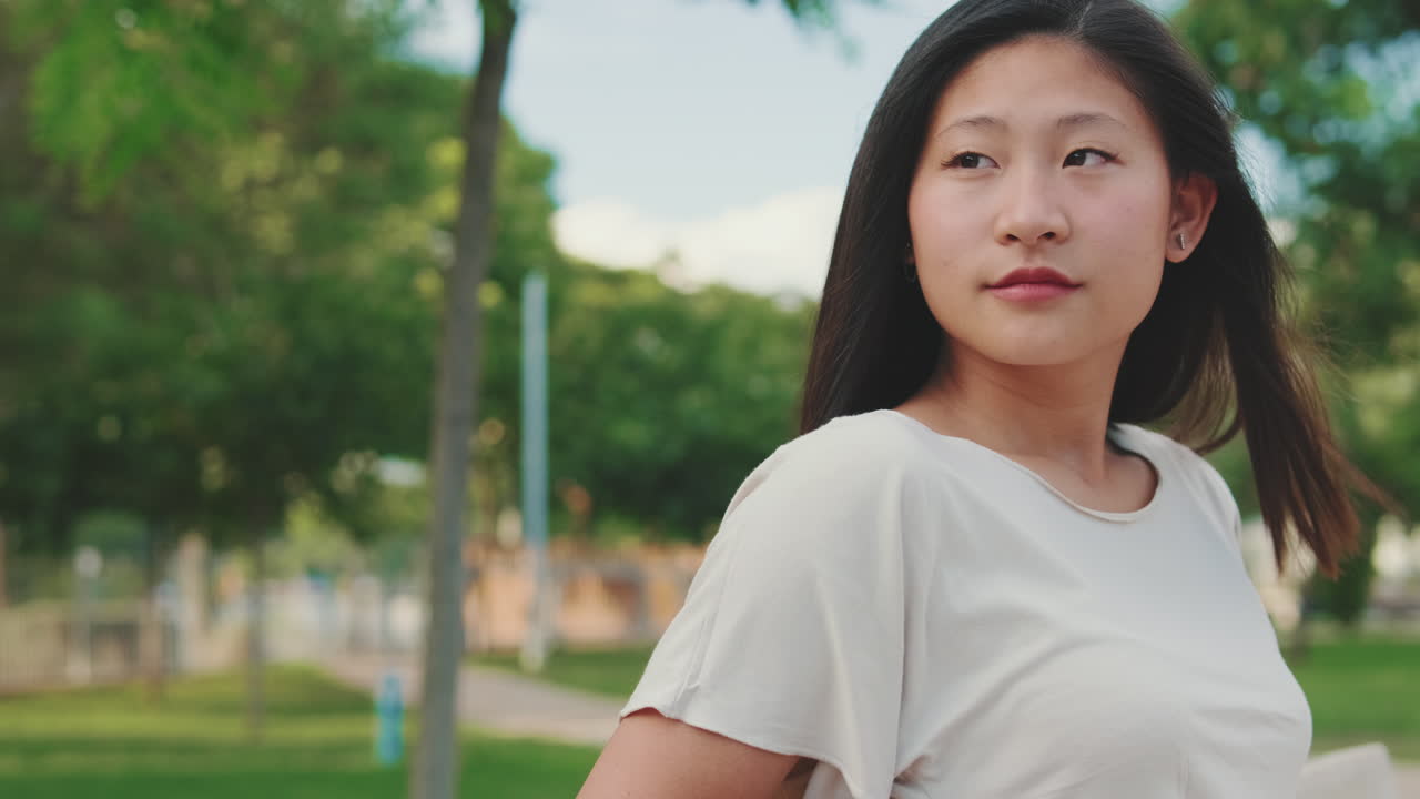 Asian woman portrait in a park