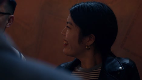 conversation at a nighttime cafe