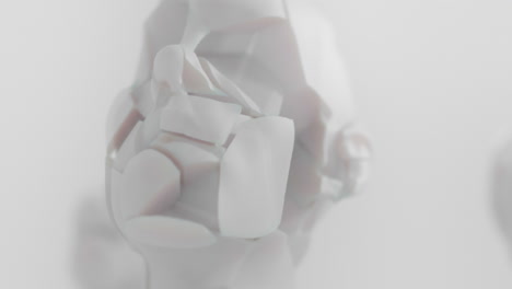 three crushed android heads on spikes in white space
