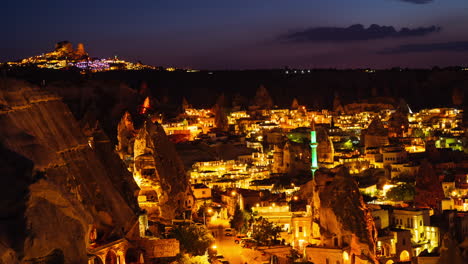 cappadocia at night: illuminated cave dwellings and fairy chimneys