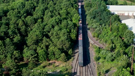 Flight-over-a-parked-train-in-Sayreville,-New-Jersey