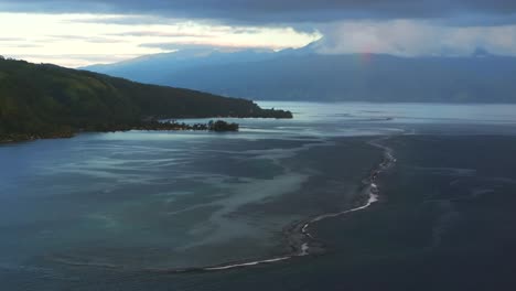 vallee de tautira bay river north shore taiarapu taravao rainbow tahiti island french polynesia aerial drone morning sunrise valley vaitia village barrier coral reef teahupoo circle right motion