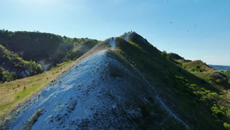 hilltop hike with paragliders