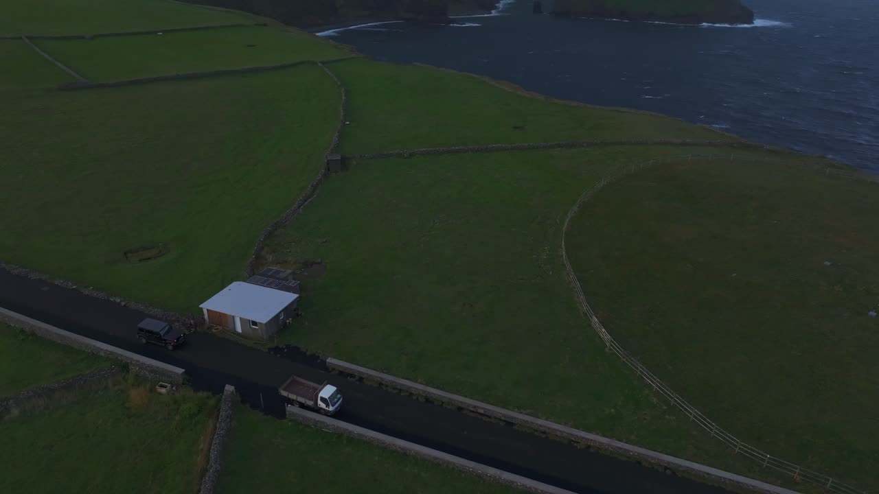 Aerial view of Farol de Albarnaz in Azores during a clear day. lighthouse, sunrise, cliff, ocean, North Atlantic,