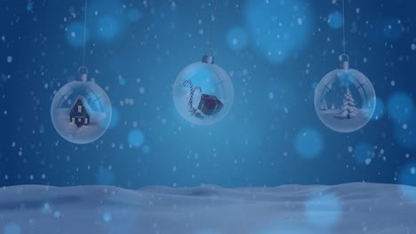 Animation-of-snow-falling-over-christmas-baubles-in-winter-scenery