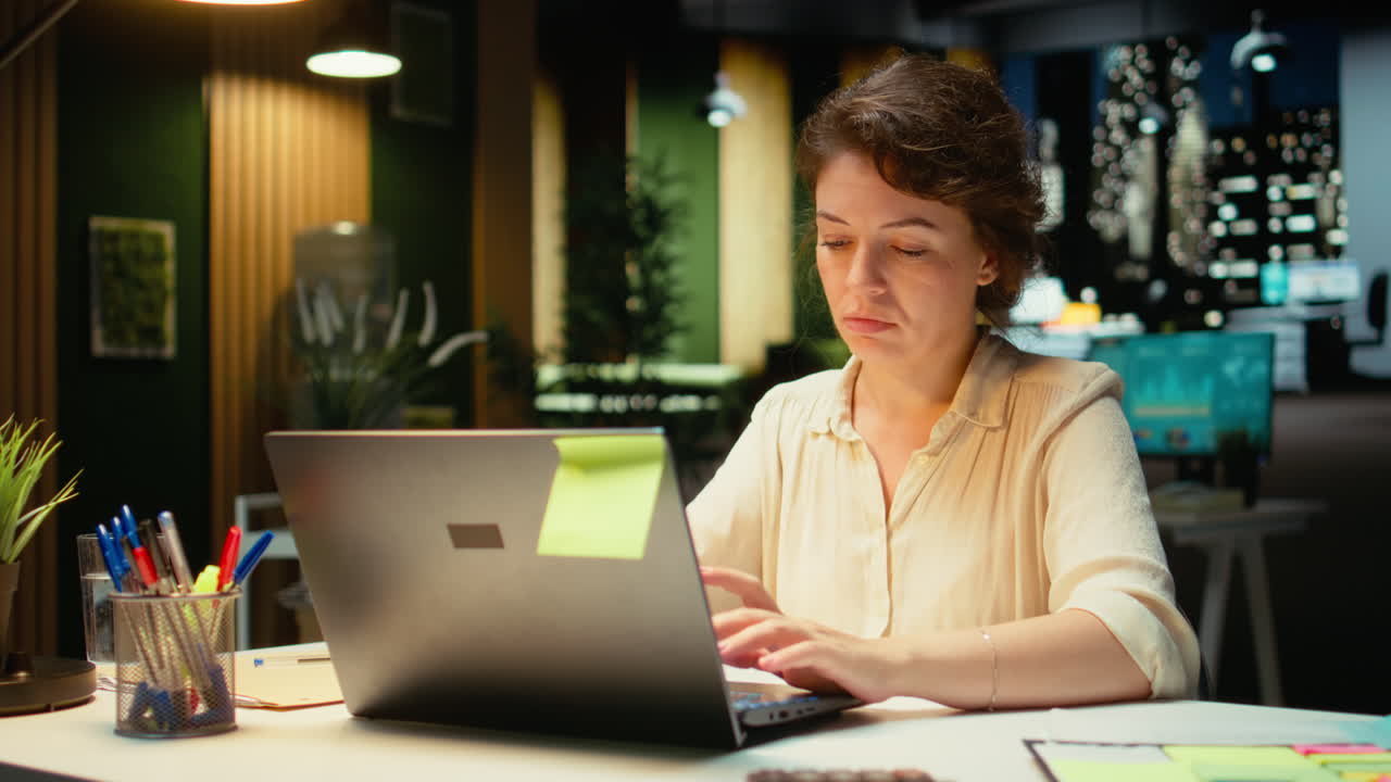 Vertical Video Corporate manager proofreading a presentation and planning objectives