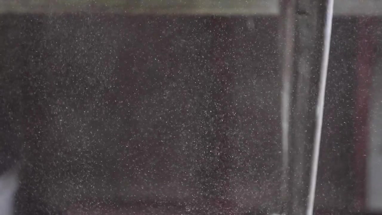 Dust in a workshop in slow motion