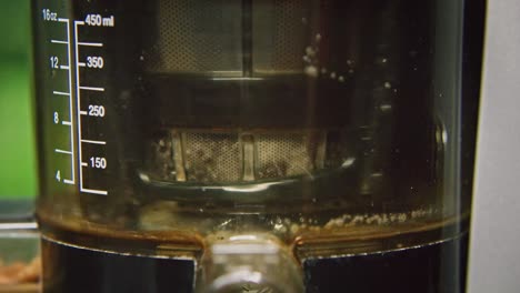 omega juicer making fresh healthy juice