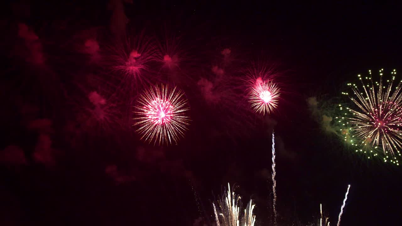 Beautiful colourful fire work display at night for celebration in festival