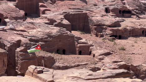 epic view of the petra valley in wadi musa, jordan with the treasury in the middle of a rocky and mountainous landscape, an unesco heritage site, ancient nabatean kingdom 4k establish shot