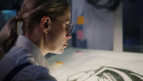 woman working on a drawing project
