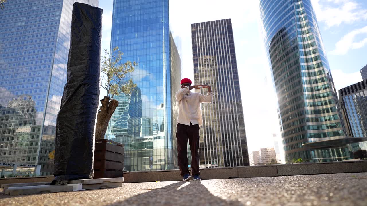 Man in urban environment with modern architecture