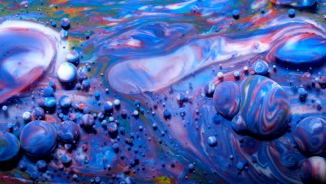 movimiento lento colores brillantes burbujas de aceite hermosa pintura color del universo moviéndose multicolor de cerca. pintura acrílica. fantástica superficie hipnótica. abstracto pintura de colores burbujas estructura de metamorfosis