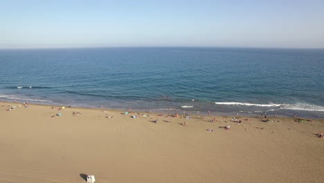 Aerial-view-of-people-on-the-ocean-coast