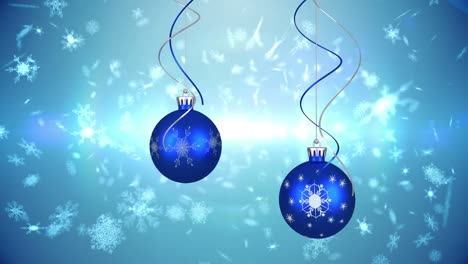 Animation-Von-Zuckerstangen,-Weihnachtskugeln-Und-Schnee,-Der-Auf-Blauen-Hintergrund-Fällt