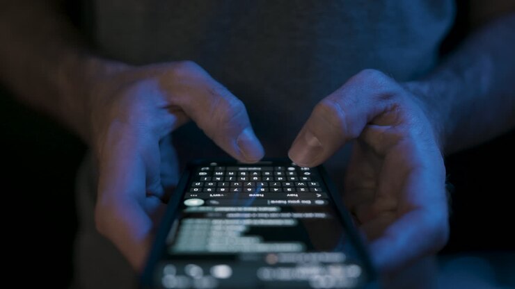 Caucasian hand typing extremely fast on a smartphone