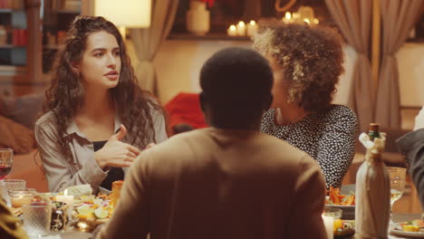 Woman-Telling-Story-During-Dinner