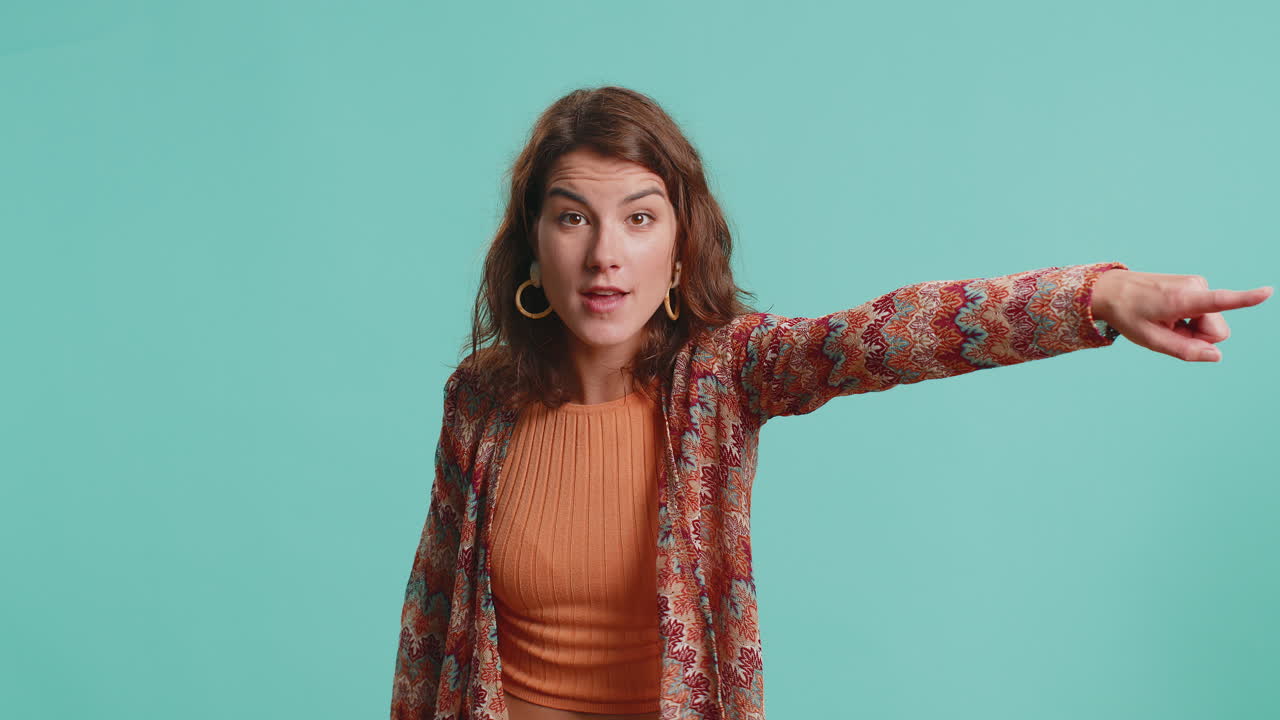 Caucasian woman pointing finger away asking to leave her alone strict boss firing conflict quarrel