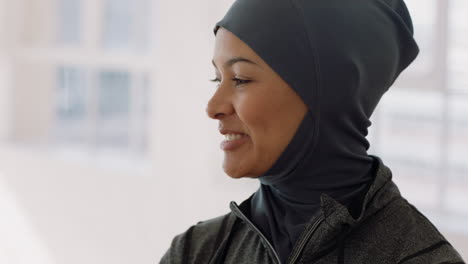 portrait-beautiful-young-muslim-woman-chatting-to-friend-in-yoga-class-discussing-healthy-fitness-lifestyle-sharing-training-tips-enjoying-conversation-in-studio-wearing-headscarf