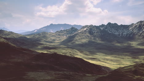 stunning mountain landscape with shadows and vibrant greenery in daylight